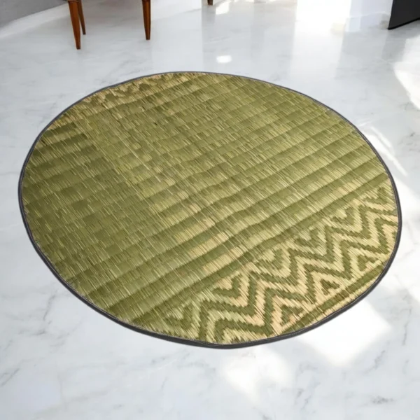 3ft round handmade river grass rug with chevron pattern on white marble flooring in a modern living space