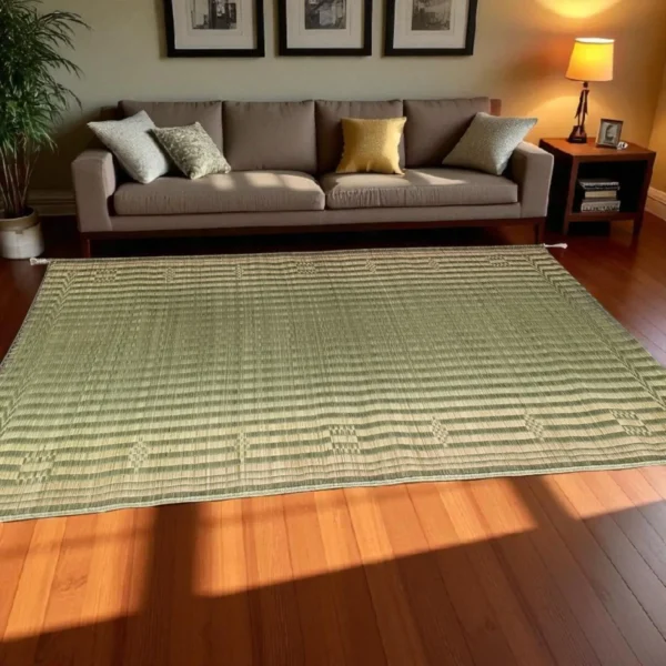 Large Korai grass mat placed on wooden floor in a cozy living room with sofa, cushions, and warm lighting