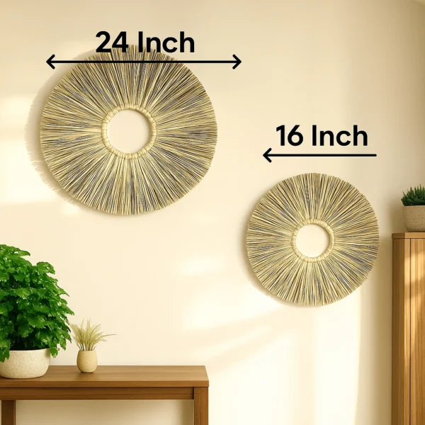 Two round handmade wall hangings made from natural grass, displayed on a beige wall, with size labels showing 24 inches and 16 inches in diameter.