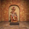 Handcrafted clay Goddess Saraswati idol with veena and swan, placed in an arched niche, showcasing traditional Indian terracotta craftsmanship.