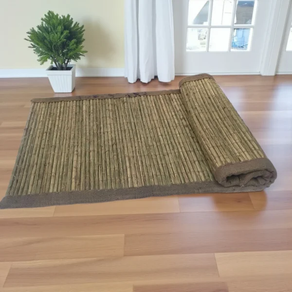 Natural handwoven Kusha grass mat placed on a wooden floor — eco-friendly reed mat for puja, yoga, and meditation.