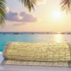 Natural handwoven Kusha grass mat rolled on a wooden surface with sea and sunset in the background — eco-friendly yoga and meditation mat.