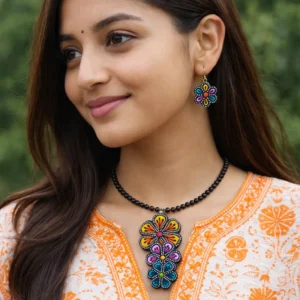 indian woman wearing handmade colorful terracotta floral necklace and earrings with traditional kurta close up
